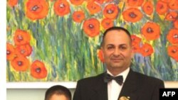 Residents and security personnel gather at the site of an explosion in a Damascus suburb in this handout released by Syria&#39;s national news agency SANA, June 8, 2012. 