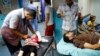 Patients are treated in Shifa hospital in Gaza City, July 18, 2014.