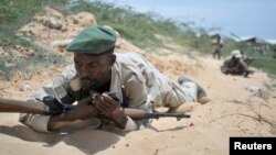 FILE - Soldiers from the Somali army train in Mogadishu, March 28, 2013.