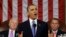 FILE - President Barack Obama, flanked by Vice President Joe Biden (L) and House Speaker John Boehner of Ohio, gives his State of the Union address during a joint session of Congress on Capitol Hill in Washington, Feb. 12, 2013.
