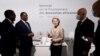 European Commission President Ursula von der Leyen speaks with the president of the African Development Bank, Senegal's President Macky Sall and Tunisia's president at a Summit on the Financing of African Economies, May 18, 2021.