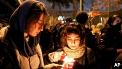 Arxiv fotosu - Tehranda Ukrayna təyyarəsinin vurulması nəticəsində həlak olanların xatirəsi anılır, 11 yanvar, 2020.