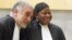 International Criminal Court (ICC) prosecutor Fatou Bensouda shares a laugh with her predecessor Luis Moreno-Ocampo (L) at the ICC, The Hague, June 15, 2012. 