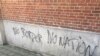 Graffiti on this Brussels refugee camp echoes the sentiments of many refugees and other migrants traveling from the Middle East and Africa to Europe. (Heather Murdock/VOA), 23 November, 2015. 