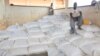 FILE - Bags of maize are seen in a distribution center at Dzaleka refugee camp in Malawi (L. Masina/VOA).
