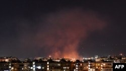 Smoke billows following an Israeli airstrike targeting south of the capital Damascus, Syria, July 20, 2020.
