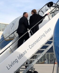 Secretary of State Mike Pompeo and his wife Susan Pompeo departing Munich for Senegal.