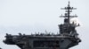 FILE - The USS Theodore Roosevelt is seen while entering the port at Da Nang, Vietnam, March 5, 2020.