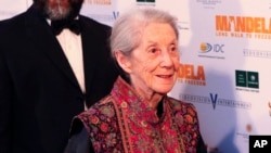 FILE - Nobel Priize winning author Nadine Gordimer arrives for the South African premier of the movie "Mandela - Long Walk To Freedom" in Johannesburg, Nov. 3, 2013.