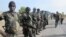 FILE - Cameroon's army soldiers deploy against the Nigerian Islamist group Boko Haram in Dabanga, northern Cameroon, June 17, 2014.