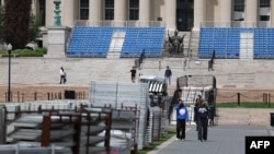 Students walk inside Columbia University in New York City on May 6, 2024. (Photo by CHARLY TRIBALLEAU / AFP)