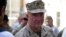 FILE - Marine Gen. Frank McKenzie, the head of U.S. Central Command, attends a ceremony at Resolute Support headquarters, in Kabul, Afghanistan, July 12, 2021.