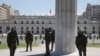 Riot police guard La Moneda presidential palace in Santiago, Chile, Oct. 30, 2019. 
