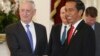 U.S. Defense Secretary Jim Mattis, left, shakes hands with Indonesian President Joko Widodo before a meeting at Merdeka palace in Jakarta, Indonesia, Jan. 23, 2018. 