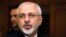 FILE - Iranian Foreign Minister Mohammad Javad Zarif talks with reporters in Geneva, Switzerland. 