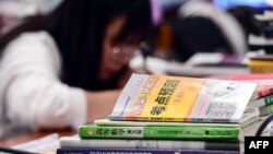 Etudiante dans une université chinoise, 26 novembre 2019 (Photo AFP)
