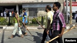 지난 19일 이집트 반정부 시위대가 정부 청사 앞에서 무르시 대통령의 퇴진을 요구하고 있다.