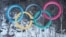 FILE – The Olympic rings are seen at Jeongseon Alpine Center, Pyeongchang, South Korea, Feb. 11, 2018. Canada declared its bid to host the 2026 Winter Olympics dead Monday after a failed referendum.