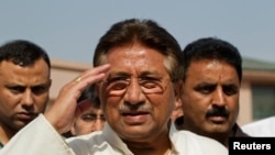 Pakistan's former President and head of the All Pakistan Muslim League (APML) political party Pervez Musharraf salutes as he arrives to unveil his party manifesto for the forthcoming general election at his residence in Islamabad, April 15, 2013. 