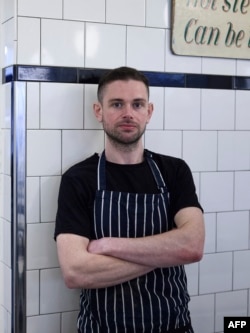 Neil Vening, owner of G Kelly, is pictured at the shop in east London, Feb. 19, 2025. For many years, pie and mash, a working-class staple, has had a humble reputation among outsiders. Its fans are now trying to change that.