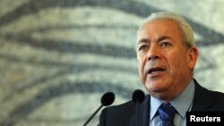 Burhan Ghalioun, head of the opposition Syrian National Council, speaks during a news conference with Italy's Foreign Minister Giulio Terzi di Sant'Agata in Rome, May 13, 2012. 