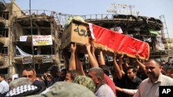 ساکنان بغداد روز سه شنبه در مراسم تشییع جنازه قربانایان بمبگذاری روز شنبه، خواستار برخورد با "سلول های خفته" داعش شده اند.