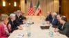 U.S. Secretary of State John Kerry, third from left, meets with Iranian Foreign Minister Mohammad Javad Zarif, third from right, for a new round of nuclear negotiations, March 4, 2015.