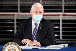 FILE - Vice President Mike Pence speaks in Bloomington, Ind., Dec. 15, 2020.