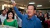 FILE - Prime Minister Hun Sen of the Cambodian People's Party shows off his ballot paper at Takhmau polling station in Kandal province, southeast of Phnom Penh, June 4, 2017.