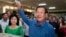 FILE - Prime Minister Hun Sen of the Cambodian People's Party shows off his ballot paper at Takhmau polling station in Kandal province, southeast of Phnom Penh, June 4, 2017.