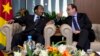 FILE - French president Francois Hollande (R) talks to Cameroon's president Paul Biya, on November 30, 2014, in Dakar, as part of the 15th International Organization of French-Speakers (Francophonie) summit. 