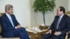 U.S. Secretary of State John Kerry, left, talks with Egypt’s President Abdel Fattah el-Sissi before a meeting at the presidential palace in Cairo, Egypt, June 22, 2014. 
