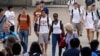 FILE - At the University of Texas in Austin, a campus that was once slow to integrate, the student body, like the state, is "majority-minority." 