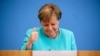 German Chancellor Angela Merkel reacts as she holds her annual summer news conference in Berlin, Germany, July 22, 2021. 