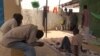 FILE - Ex-Boko Haram fighters in one of the buildings of the transitional camp in Diffa, Niger. Apr. 17 2017. (N. Pinault/VOA)