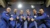 Participants of the Mars500 experiment, which simulated a 520-day flight to Mars, pose for a picture during a news conference in Moscow, November 8, 2011