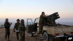 نیروهای کرد در عملیات آزادسازی موصل در یکی از روستاهای اطراف شهر 