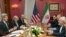 U.S. Secretary of State John Kerry, left, holds a meeting with Iran's Foreign Minister Mohammad Javad Zarif, right, over Iran's nuclear program in Lausanne, Switzerland, Tuesday, March 17, 2015.