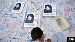 İran mediası Fransanın birinci xanımını hədəf alıb