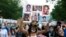 Demonstrators march near the White House, to protest police brutality and racism, on June 10, 2020 in Washington, DC. - Demonstrations are being held across the US following the death of George Floyd on May 25, 2020, while being arrested in…