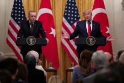 FILE - President Donald Trump speaks during a news conference with Turkish President Recep Tayyip Erdogan in the East Room of the White House, Nov. 13, 2019, in Washington.