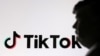这张于2025年1月19日拍摄的插图中可以看到美国总统唐纳德·特朗普(Donald J. Trump)和TikTok徽标的3D打印微缩模型。(路透社)