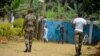 FILE - Government soldiers are seen on patrol in Bafut, in the restive northwest English-speaking region of Cameroon, Nov. 15, 2017.