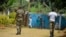 FILE - Government soldiers are seen on patrol in Bafut, in the restive northwest English-speaking region of Cameroon, Nov. 15, 2017.