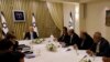 Israeli President Reuven Rivlin, cener left, speaks with members of the Joint List Ayman Odeh, fourth right, Ahmad Tibi, third right, Mansour Abbas, second right, and Osama Saadi, right, during a consultation meeting with in Jerusalem, Sept. 22, 2019.