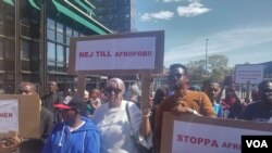 Somali migrants protest in Orebro, Sweden, May 7, 2016. They were protesting in response to what they called a racist video posted by Amineh Kakabaveh, a Swedish parliamentarian, to her Facebook page last week.