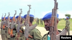 Soldiers of DRC stand at Kamina training base in Katanga province, 2005. 