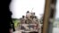 FILE - A Nigerian army convoy vehicle drives ahead with an anti-aircraft gun on its way to Bama, Borno State, Nigeria, Aug. 31, 2016.