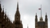 FILE - The British union flag flies at half-mast above Victoria Tower on the Palace of Westminster, in London, June 20, 2016.