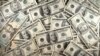 FILE - US currency is seen in this January 30, 2001 image. 